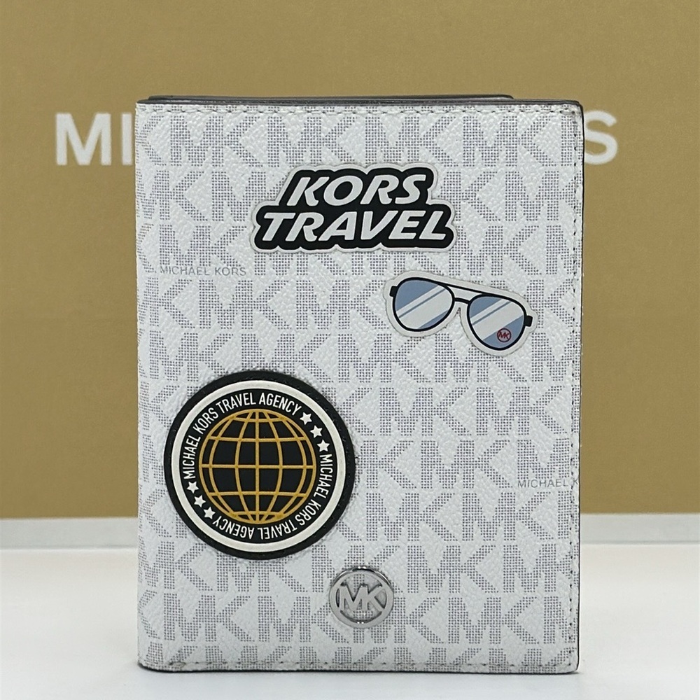 Michael Kors Jet Set Travel Medium Embellished Signature Logo Passport Case
Opti - Picture 6 of 9